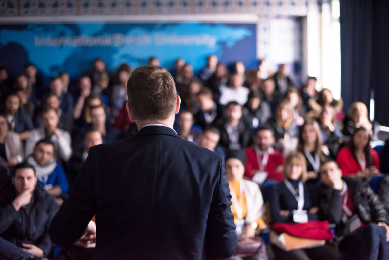 successful businessman giving presentations at conference room